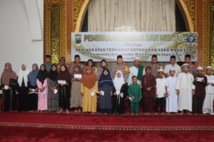 Ramadhan Berkah, Kapolres Pasuruan Bagikan 725 Paket Beras Zakat Fitrah ke Anak Yatim dan Duwafa